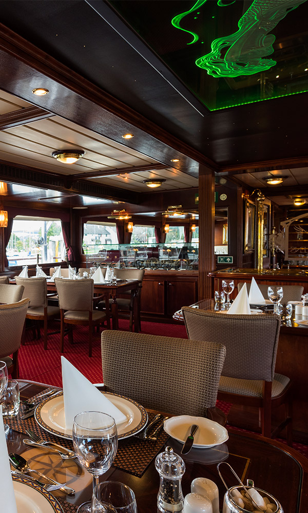 The Robert Louis Stevenson Restaurant with a lighting effect on the ceiling on the Alexander Graham Bell deck on Lord of the Glens cruise ship